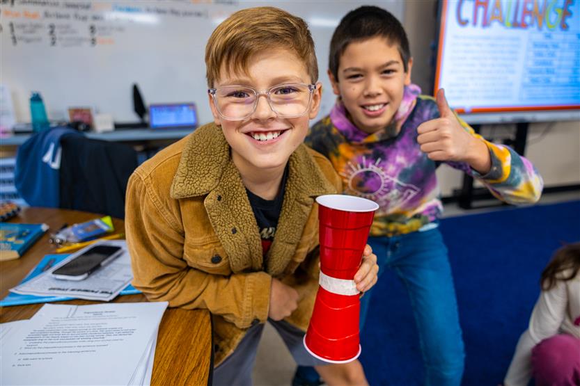 Students do a pumpkin STEM challenge